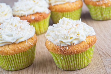 delicious homemade muffins over wooden board