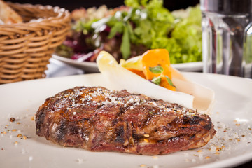 Grilled beef steak with seasoning