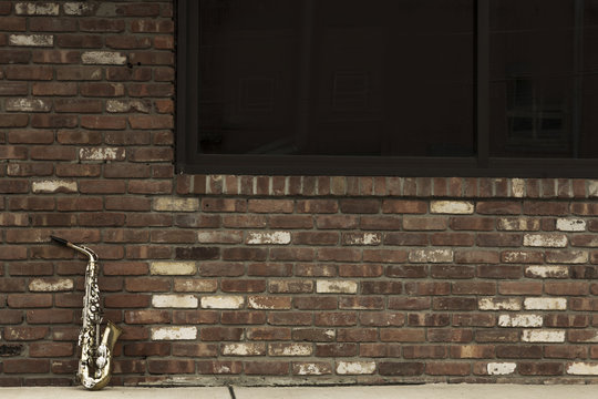 Saxophone Brick Wall