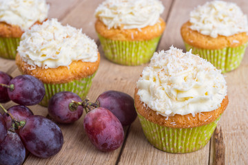 delicious homemade muffins over wooden board