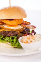 Delicious egg and bacon cheeseburger