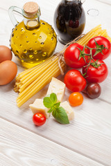 Italian food cooking ingredients. Pasta, tomatoes, basil