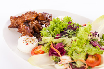 grilled beef stripes fresh salad and goat cheese