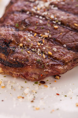 Grilled beef steak with seasoning