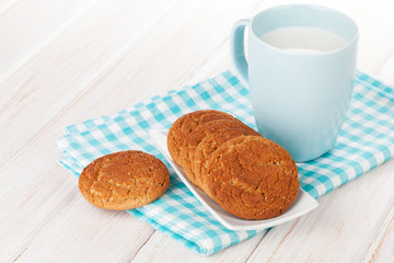 Cup of milk and gingerbread cookies