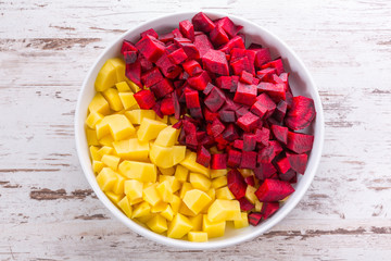 Sliced potatoes and beetroots for a soup