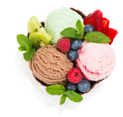 Berry and chocolate ice cream with fresh fruits, top view