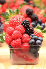 raspberries, blackberries, strawberries summer background