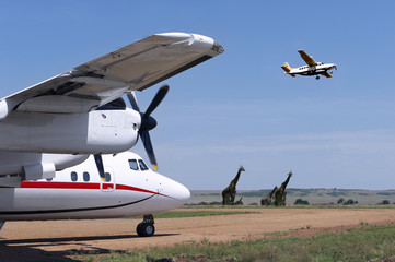 Fototapeta na wymiar Aircraft at the aerodrome, the natural park of Masai Mara