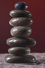 seven stones in the sand,black-ground purple