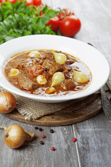 Stewed beef with onions and tomatoes, stifado