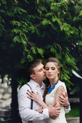 Fototapeta premium couple walk in old town lviv,kissing,loving. On the roof