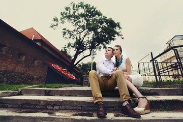 couple walk in old town lviv,kissing,loving. On the roof