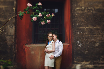 couple walk in old town lviv,kissing,loving. On the roof