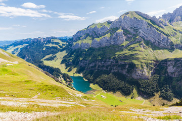 Fototapeta na wymiar Panorama view of Seealpsee (lake) and Alpstein massif