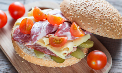 Sandwich with  ham, cheese and cherry tomatoes