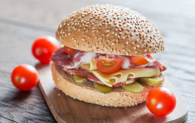 Sandwich with  ham, cheese and cherry tomatoes