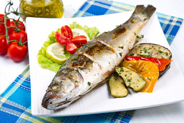 fish, sea bass grilled with lemon and grilled vegetables