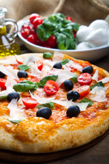 american pizza with tuna, red beans and mais