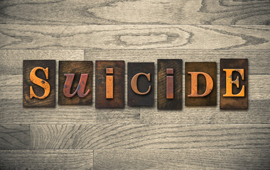 Naklejka premium Suicide Wooden Letterpress Theme