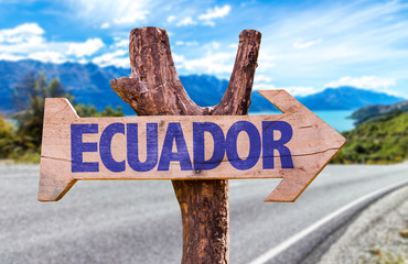 Ecuador wooden sign with road background