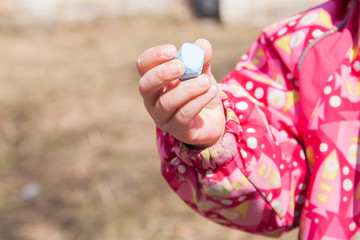chalk in the hands of a child