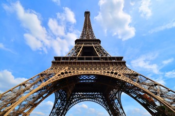 Iconic Eiffel Tower, Paris, France with vibrant blue sky