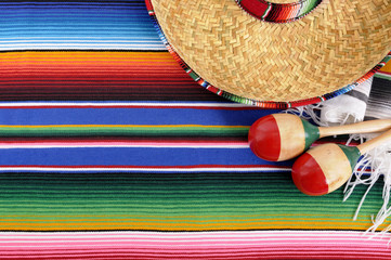 Mexican background serape striped blanket with sombrero maracas Mexico cinco de mayo festival vacation photo © david_franklin