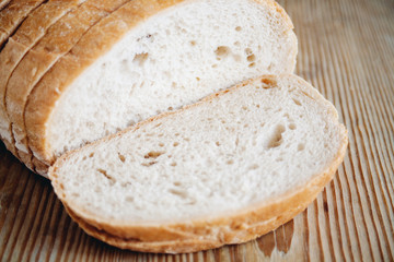 sliced bread on wooden surface