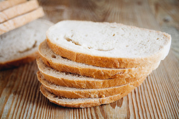 sliced bread on wooden surface