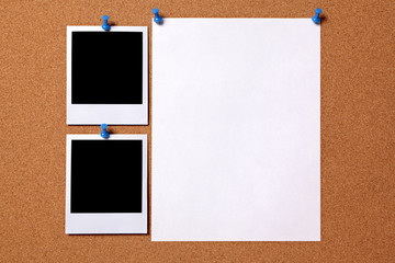 Two polaroid style photo frame print pinned to a cork notice board background with blank white...