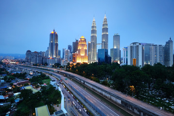 Fototapeta na wymiar Kuala Lumpur skyscraper night scenery during blue hour.