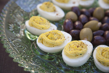 Fototapeta na wymiar Deviled Eggs and Olives before dinner