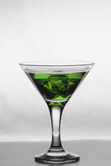 Martini glass on wooden table