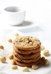 the chocolate and macadamia cookies on dish set for coffee break