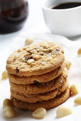 the chocolate and macadamia cookies on dish set for coffee break