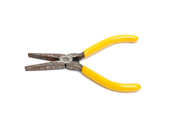 Obraz premium Rusty yellow pliers isolated on white