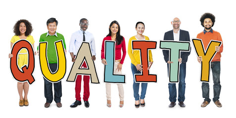 Fototapeta premium Group of People Standing Holding Quality Letter Concept