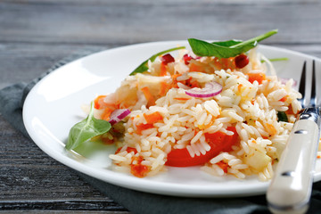 Delicious rice with onions and basil