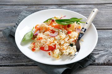 Tasty rice with onions and tomatoes