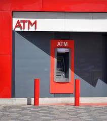 Red ATM in a wall
