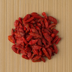 Circle of dry red goji berries