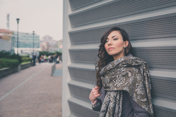 Beautiful girl posing in an urban context