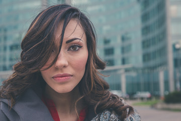 Beautiful girl posing in an urban context