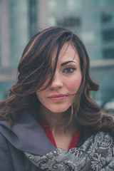 Beautiful girl posing in an urban context