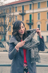 Beautiful girl posing in an urban context