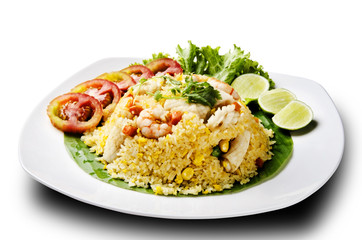 seafood fried rice with tomato and lemon