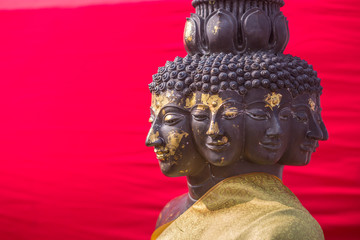 multiple faces Buddha