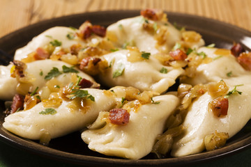 Delicious homemade dumplings with onion and bacon