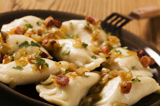 Delicious homemade dumplings with onion and bacon